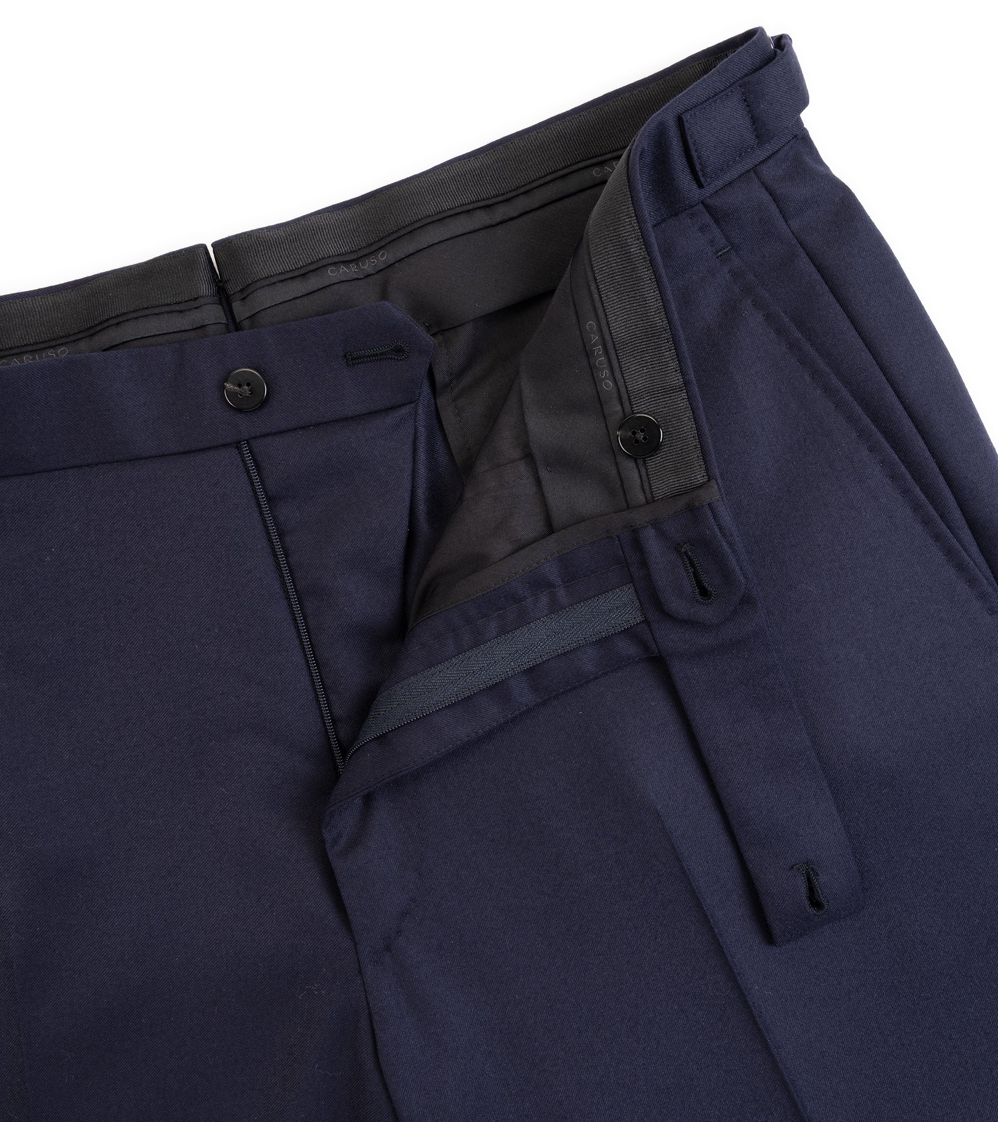 Caruso superlight wool flannel suit jacket in navy, close-up details of the trousers showing the zip fly and button closure.