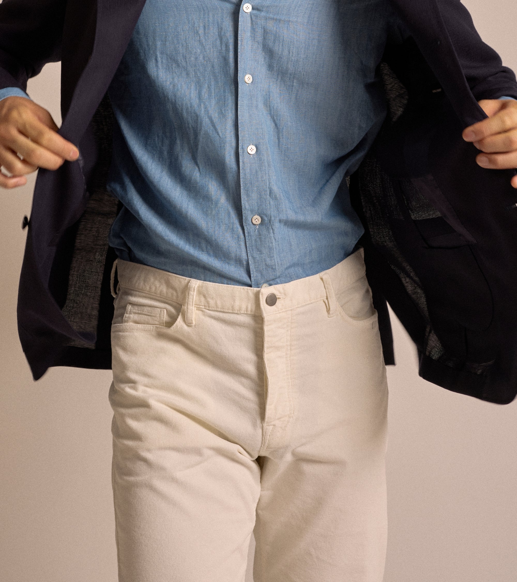 Trunk Dean corduroy 5-pocket trousers in egret white, styled shot.