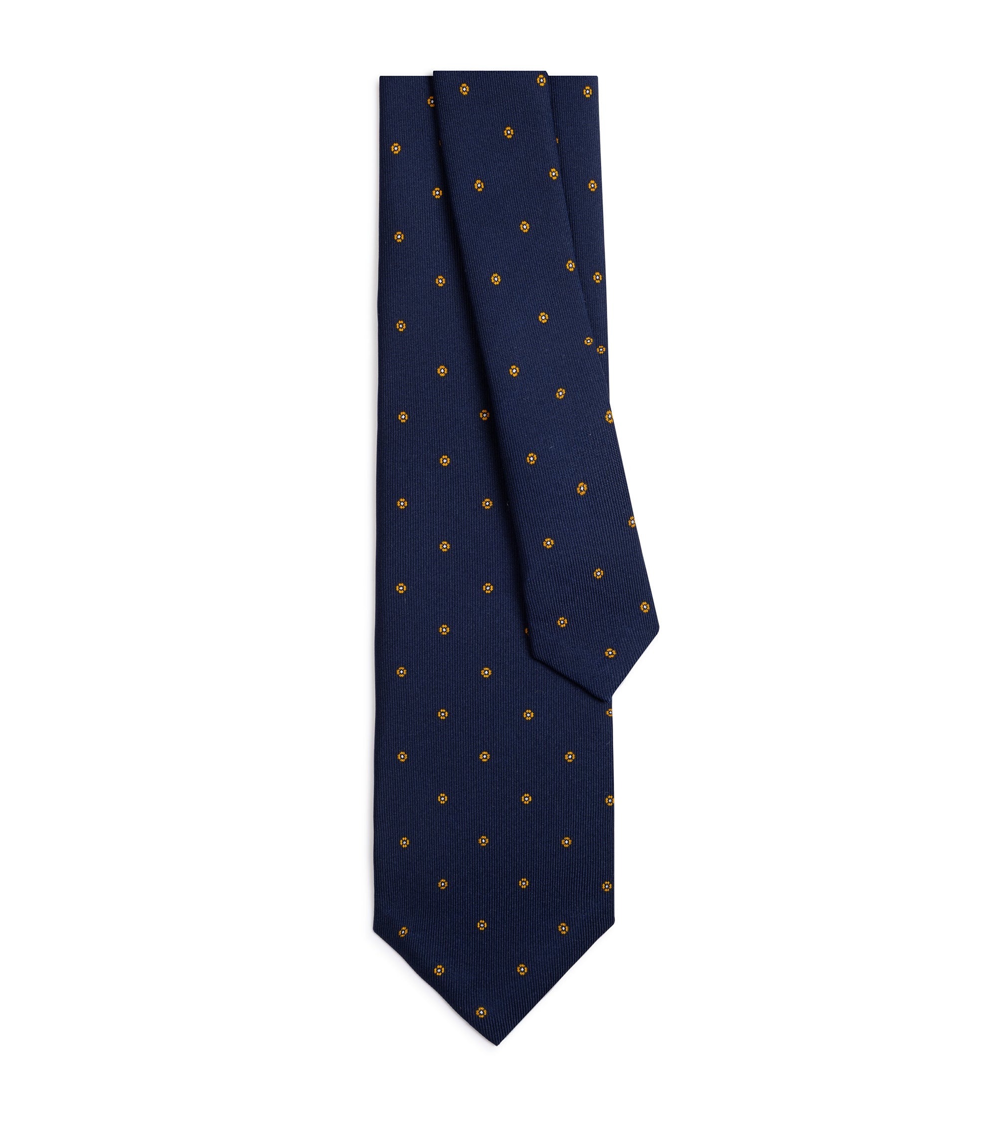 A navy necktie with a small repeating pattern of tiny yellow flowers, displayed flat against a solid white background.